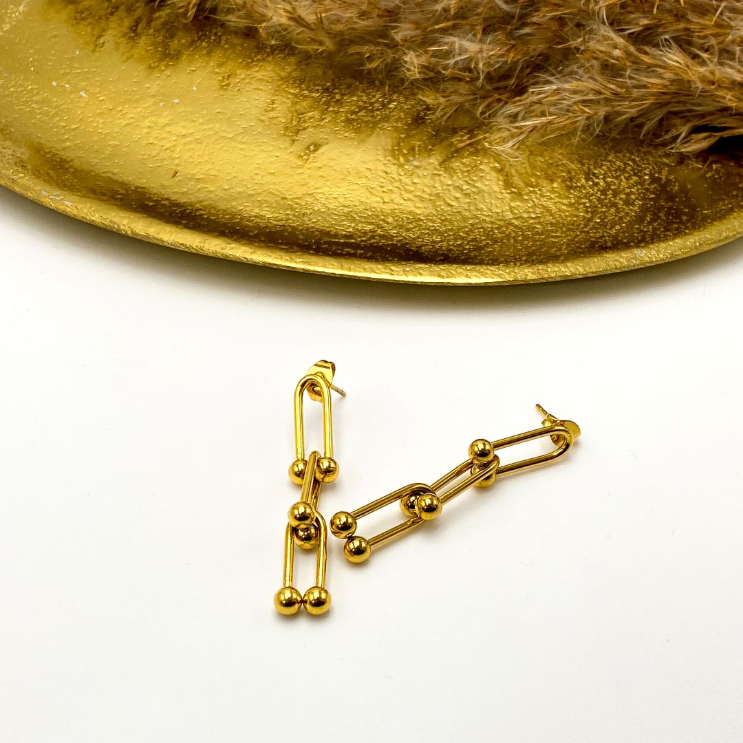 T earrings
