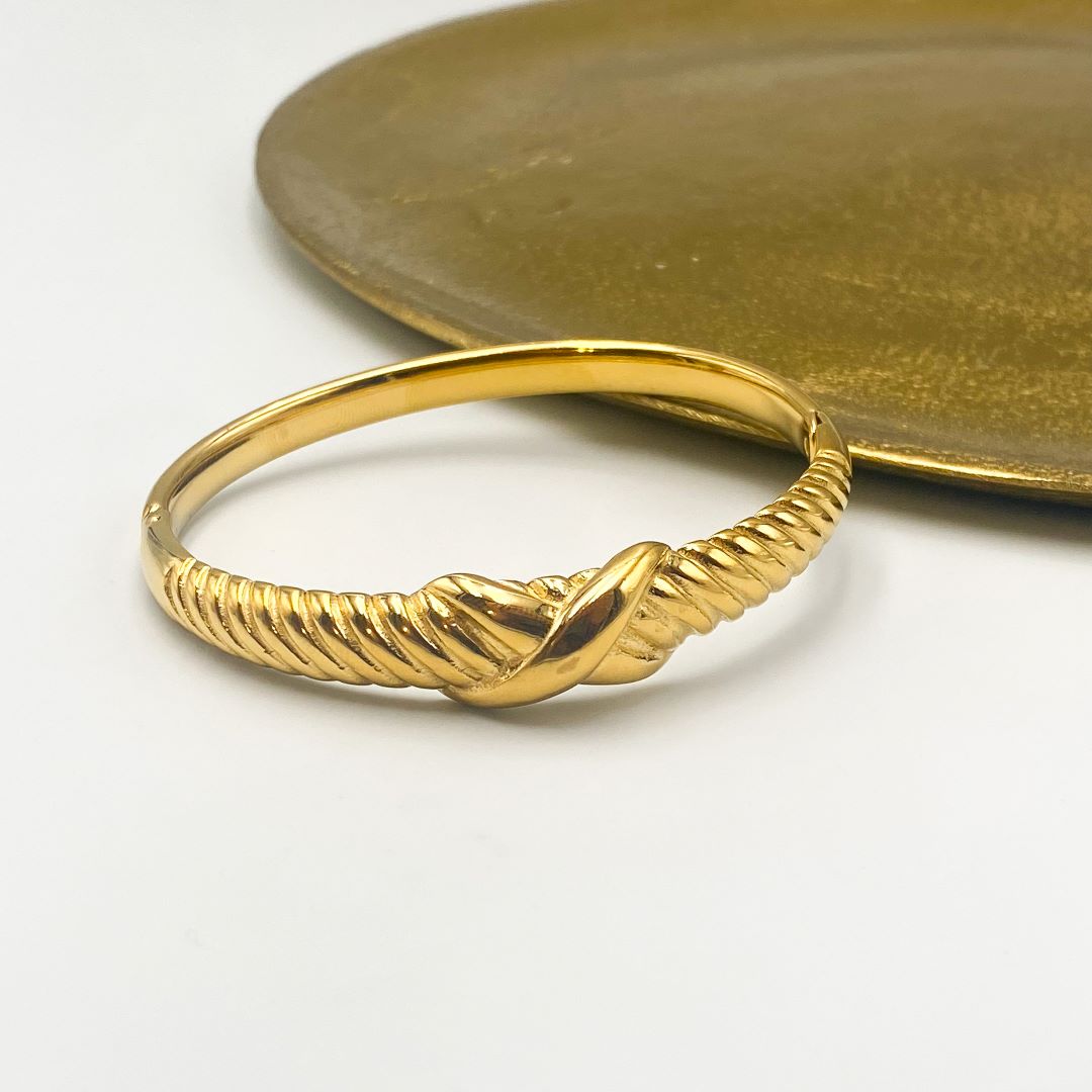 Brazalete X